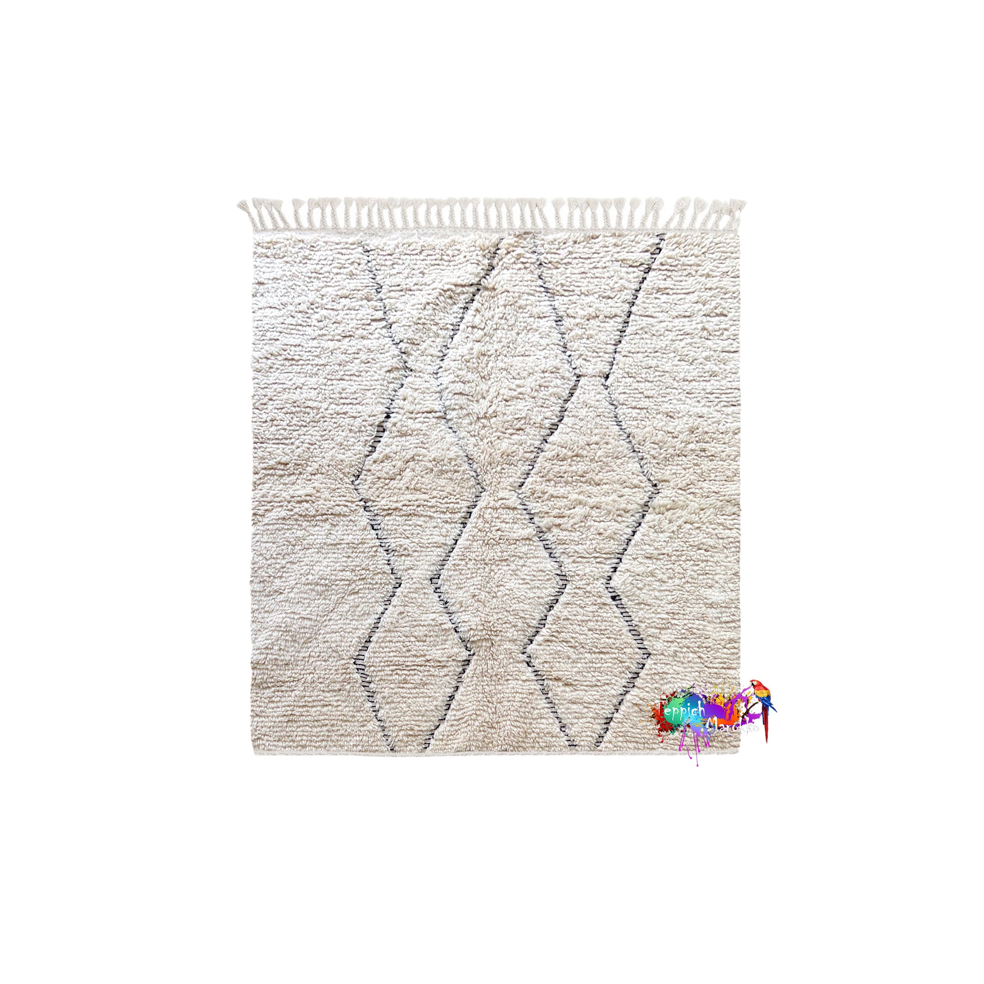 a beige rug with a geometric pattern, and there is a small, colorful object placed on the right side of the rug.